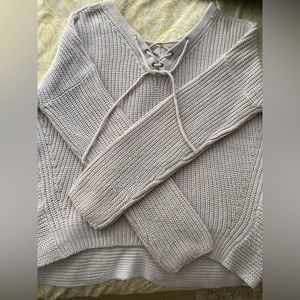 comfy knit sweater with ties in the front